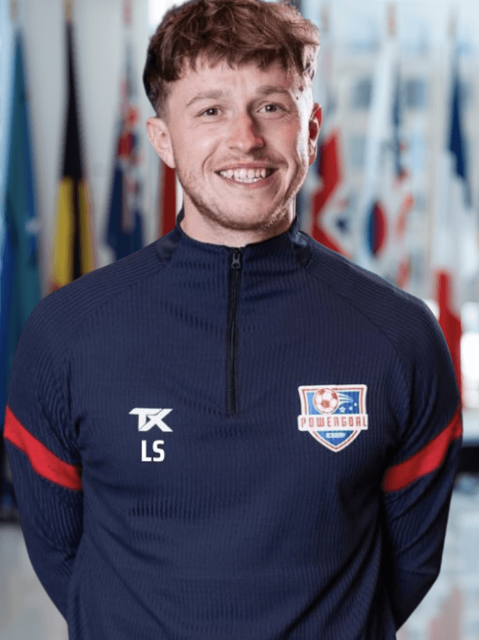 Powergoal Academy coach in the club tracksuit
